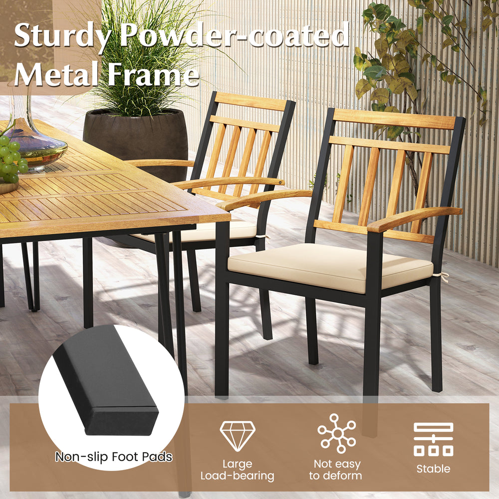 Patio dining set featuring metal chairs with acacia wood armrests and soft cushions, ideal for outdoor gatherings.