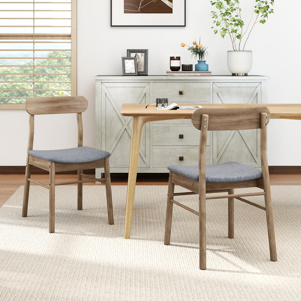 Set of 2 fabric upholstered dining chairs with rubber wood frame in oak, featuring curved backrest for lumbar support.