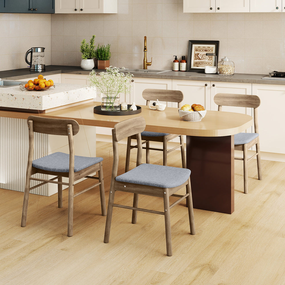 Set of four fabric upholstered dining chairs with rubber wood frames, featuring curved backrests for lumbar support.