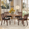 Espresso PU leather upholstered dining chairs with padded seats, set of 4, in a cozy dining room setting.