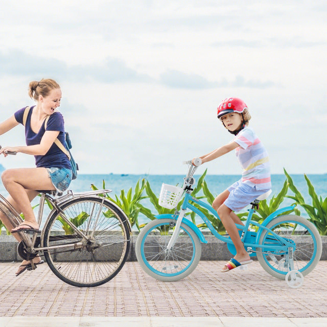 Kids bike in blue with removable basket, training wheels, and helmet, perfect for safe outdoor riding.