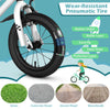 Close-up of the 14-inch kids bike's wear-resistant pneumatic tire with rubber outer and protective layer for durability.