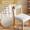 Close-up of a wooden dining chair with soft faux sherpa fabric, showcasing its stylish and cozy design.
