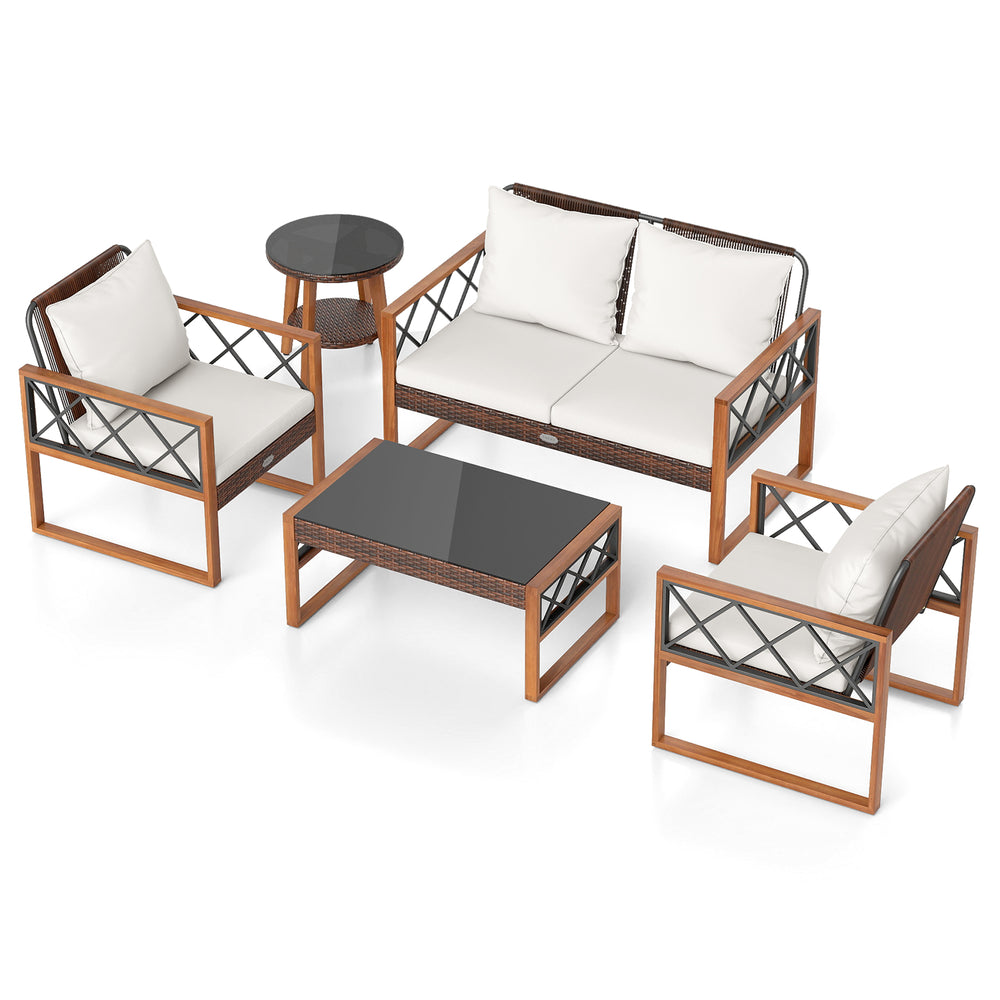 5-piece PE wicker patio furniture set with acacia wood frame, featuring cushioned loveseat and tables for outdoor.