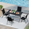Top view of the 5-piece foldable outdoor dining set, showcasing the slatted tabletop and comfortable armchairs for.