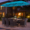 Patio dining set featuring a 15ft turquoise umbrella and 8 stackable chairs, perfect for outdoor gatherings.