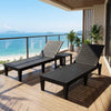 Adjustable chaise lounge set with 2 recliners and side table, perfect for outdoor relaxation on a balcony.