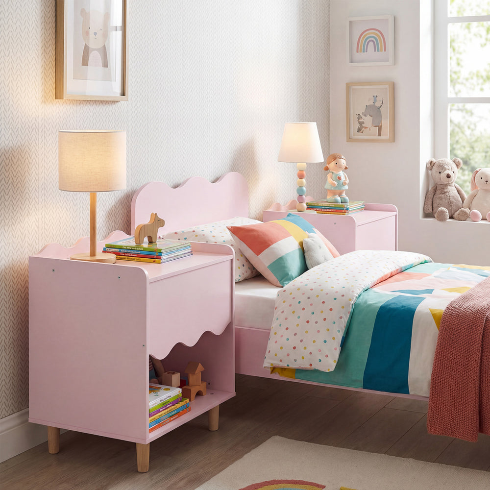 Toddler scalloped side table in pink with wide top and open compartment, perfect for kids' bedrooms and storage.