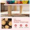 Selected rubber wood legs of the pink toddler scalloped side table, providing sturdy support for kids' storage needs.