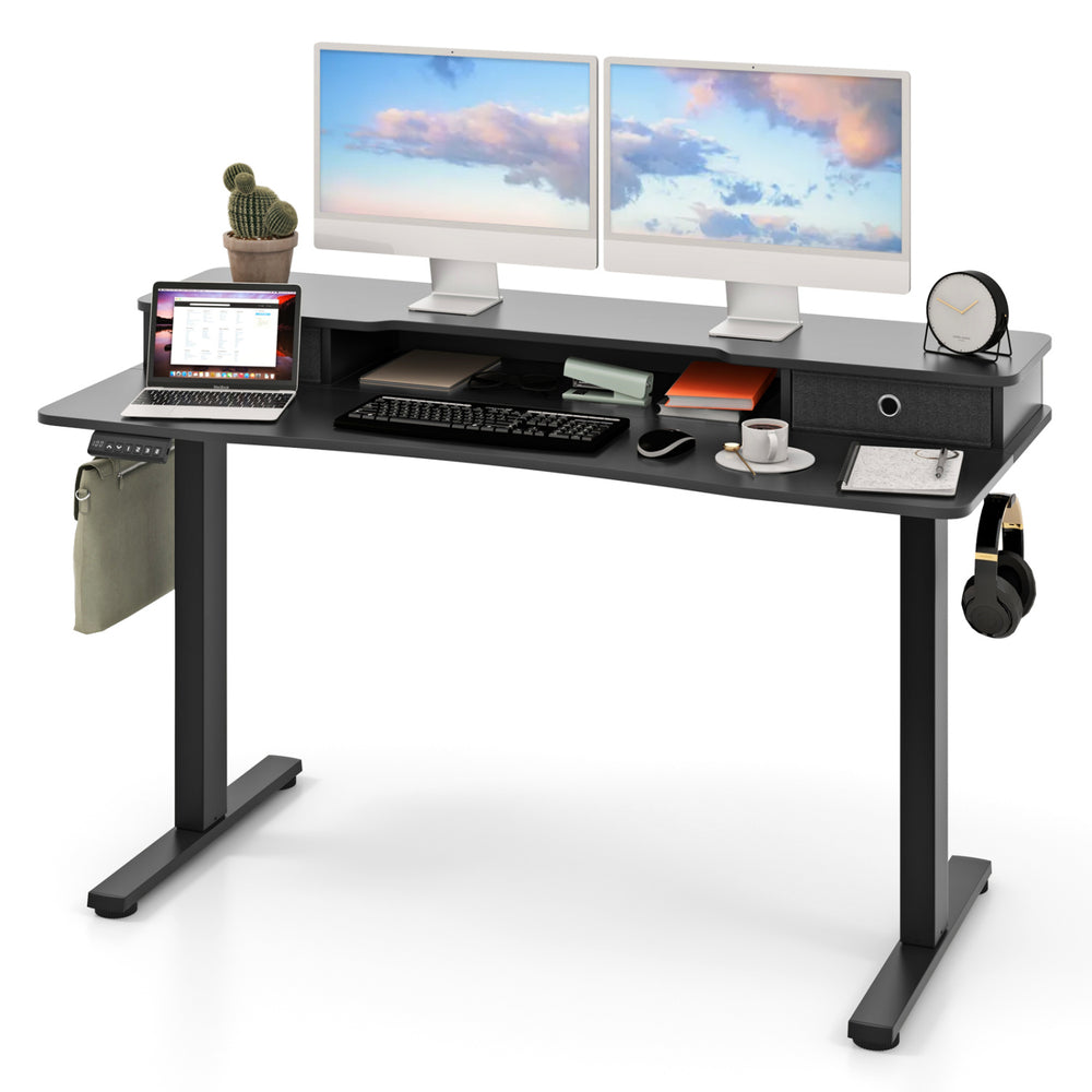 Electric height adjustable standing desk with dual monitors, ergonomic drafting chair, and built-in storage drawers.