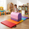 Child playing on a colorful gymnastics mat with a pink vaulting box, perfect for versatile training at home.