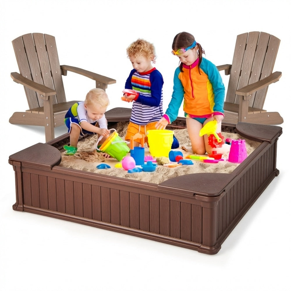 Kids playing in a large sandbox with cover, surrounded by two kid-sized Adirondack chairs for outdoor fun.