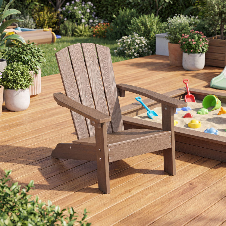 Kid-sized Adirondack chair in brown, designed for outdoor relaxation in a kids' sandbox play area.