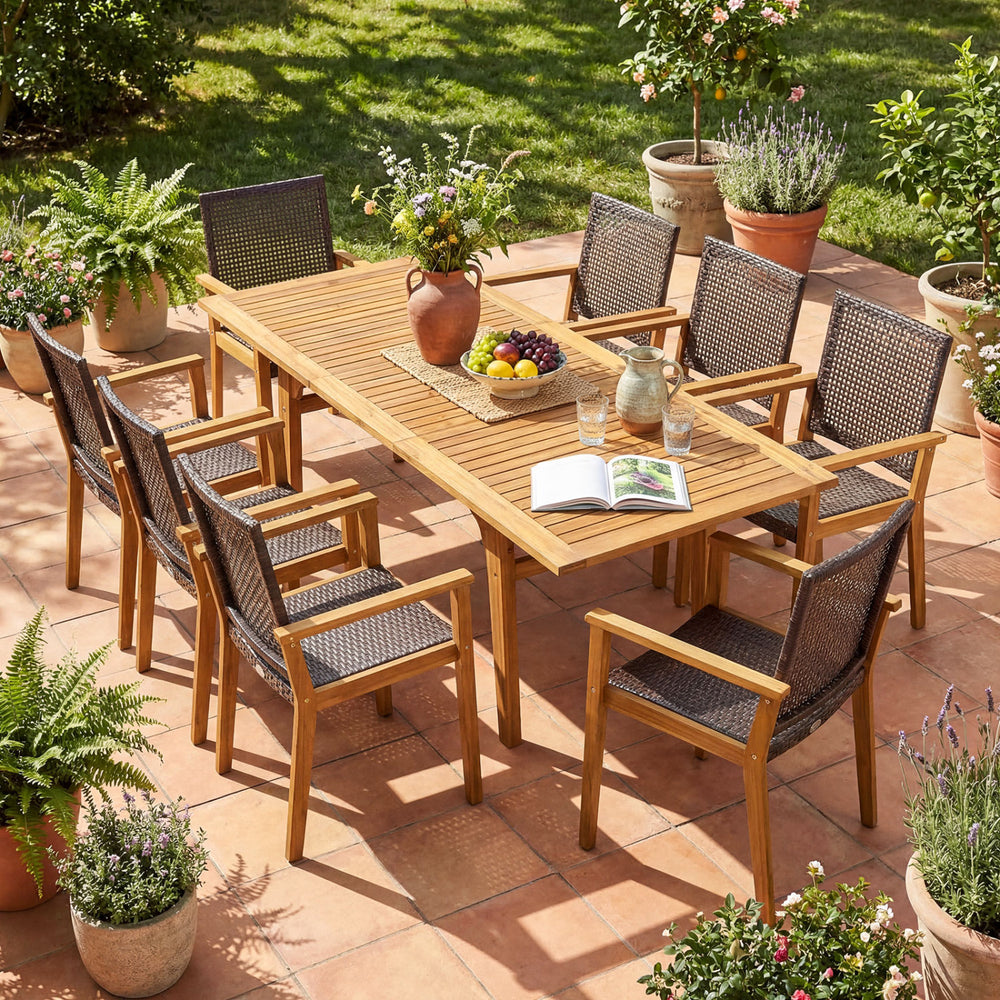 9-piece expandable patio dining set featuring acacia wood table and ergonomic PE rattan chairs, perfect for garden.
