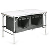 Foldable camping table with storage compartments, designed for outdoor use, perfect for camping and picnics.