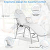Adjustable massage table with high backrest and extended footrest, designed for optimal comfort and portability.