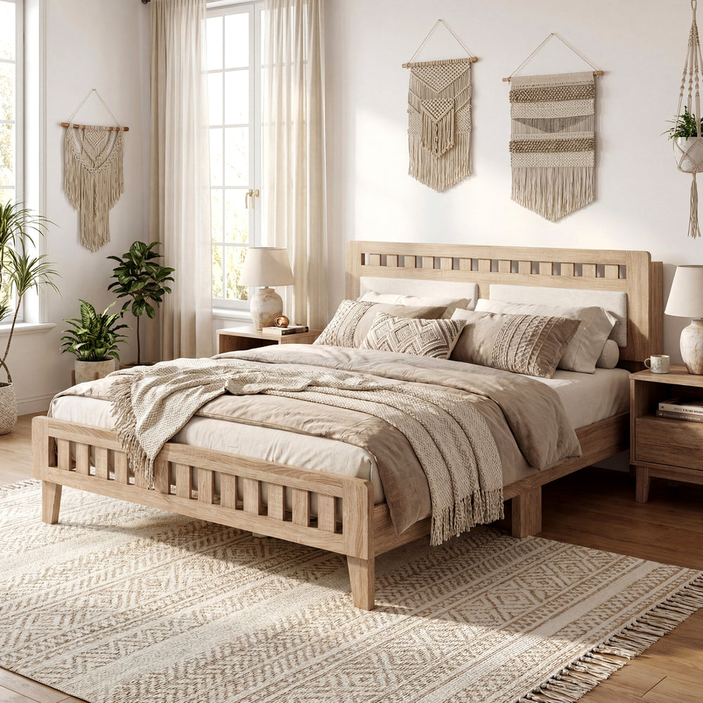 Queen wood bed frame with upholstered headboard in natural finish, styled with neutral bedding and decor in a bright.