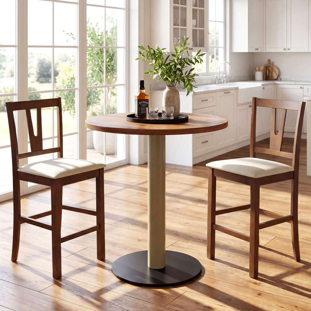 Counter height bar stools with contoured V-back in a kitchen setting, featuring a warm wood finish and cream cushions.