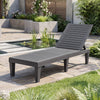 Gray outdoor chaise lounge chair with adjustable backrest, perfect for patio or poolside relaxation.