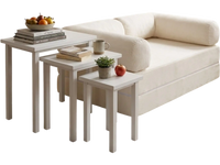Convertible sofa bed with side tables, featuring a soft corduroy cover and space-saving design for versatile use.