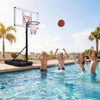 Adjustable portable basketball hoop in a pool setting, featuring a shatterproof backboard and fillable base for.