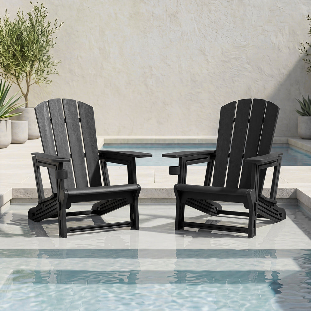 Two black HDPE Adirondack chairs with realistic wood grain, perfect for outdoor relaxation by the pool.
