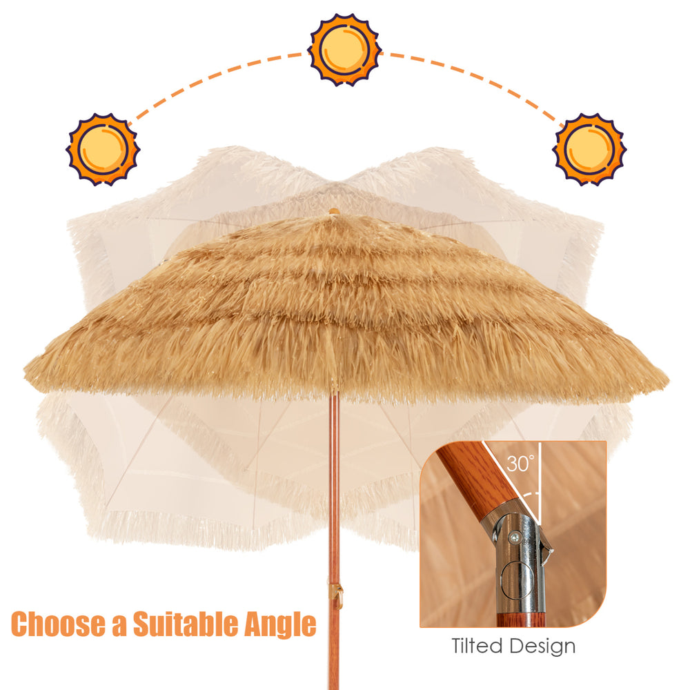 Tilted 6.5 feet portable thatched tiki beach umbrella showcasing adjustable angle for optimal sun protection and leisure.