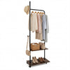 Freestanding clothes rack with hanging rods and shelves, featuring a modern rustic design for bedroom or entryway storage.
