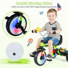 Toddler tricycle with glowing wheels, adjustable seat, basket, and removable pedals for versatile riding fun.