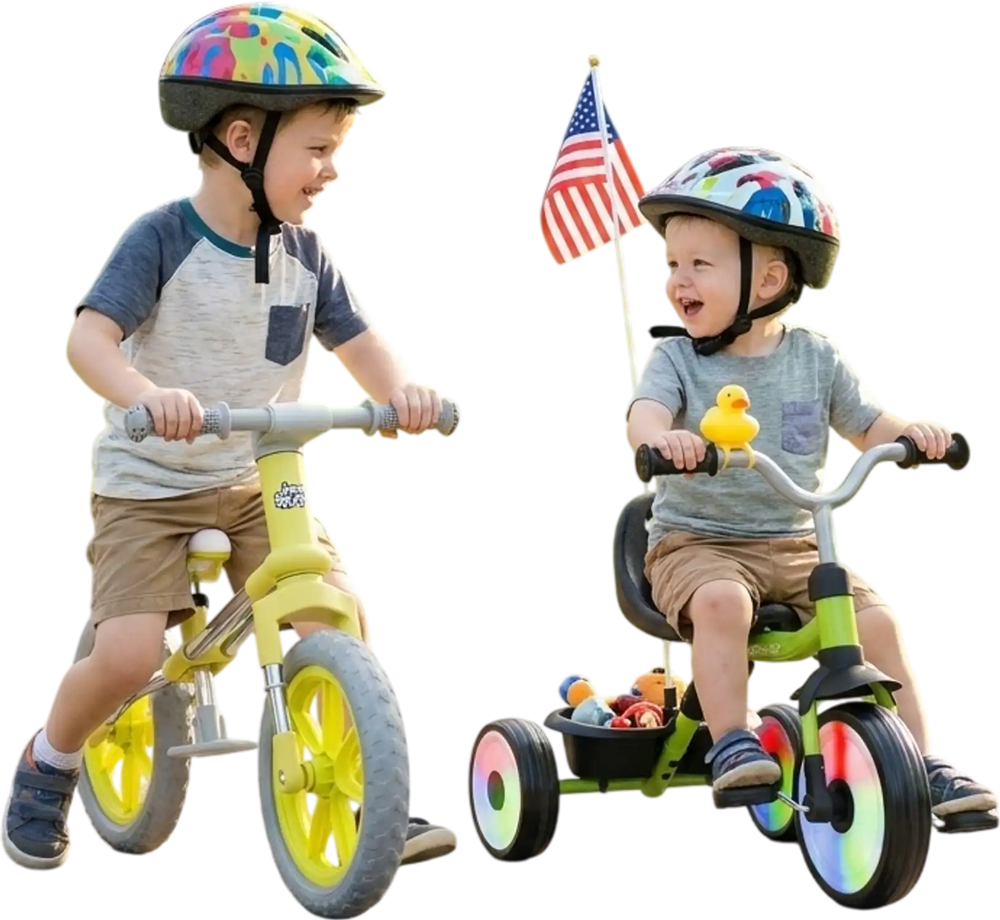 Two toddlers ride a balance bike and tricycle from the 2-piece toddler bike set, featuring glowing wheels and a basket.