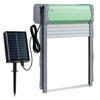 Automatic chicken coop door with solar panel, remote control, and light sensor for convenient poultry management.