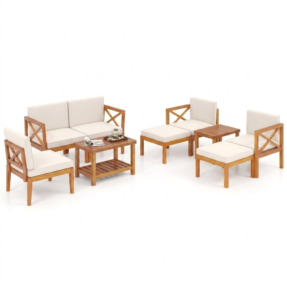 10-piece outdoor patio furniture set made of solid acacia wood with comfortable cushions, perfect for backyard gatherings.