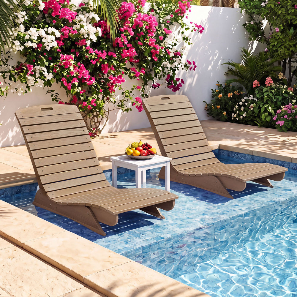 Two brown fade-resistant outdoor loungers with contoured shapes positioned by a pool, perfect for deck and patio relaxation.