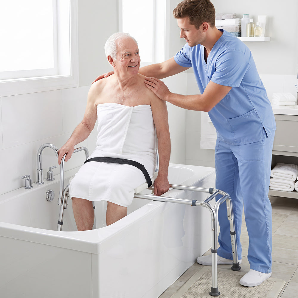 Sliding tub transfer bench with detachable armrests, height-adjustable aluminum frame, and safety belt for secure bathing.