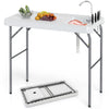 Folding fish cleaning table with built-in sink, rotatable faucet, and knife slots, perfect for fishing and outdoor use.