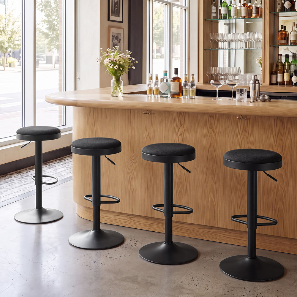 Set of 2 black kitchen bar stools with height adjustment, padded seats, and D-shaped footrests for versatile comfort.