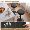 Close-up of the breathable fabric and high-density sponge filling on a black kitchen bar stool for enhanced comfort.