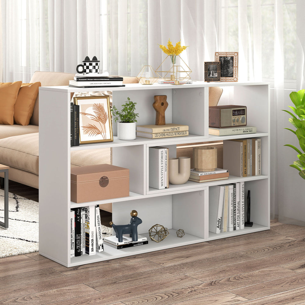 Concave and convex white bookshelf featuring three open shelves, ideal for living room storage and display.