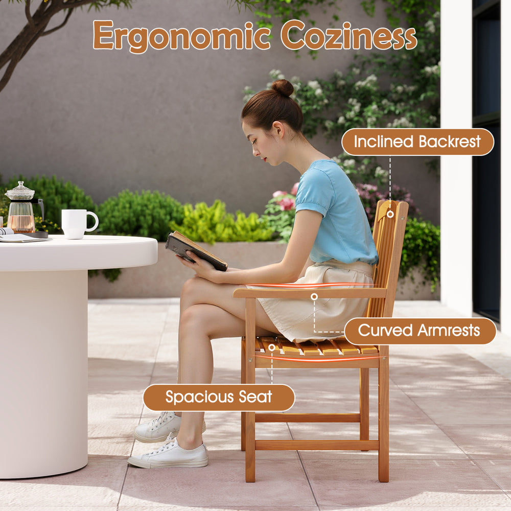 Ergonomic armchair with inclined backrest and spacious seat, made of durable acacia wood for outdoor dining comfort.