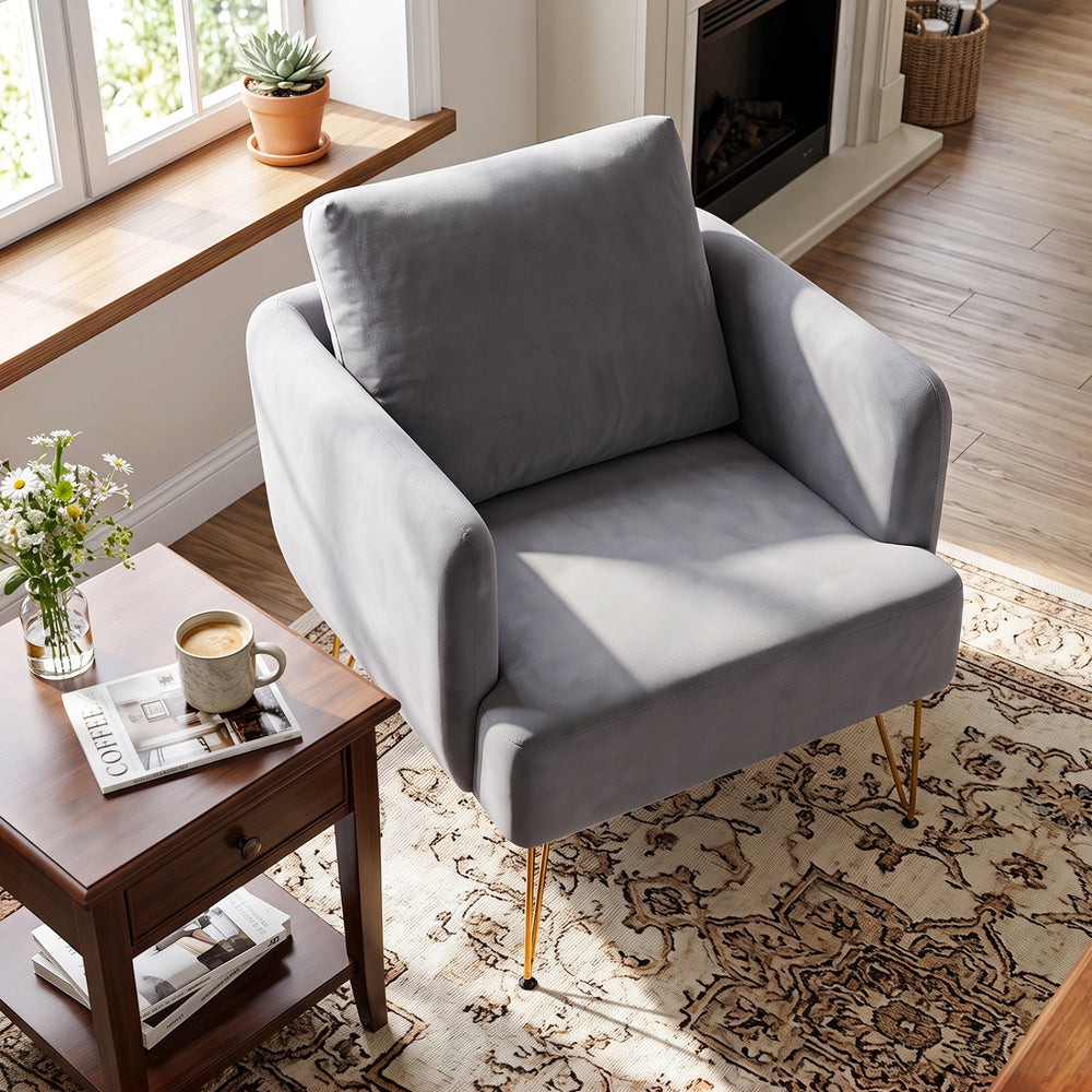 Gray modern accent chair with golden metal legs and thick back cushion, perfect for living room or bedroom comfort.