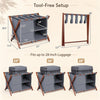 Bamboo luggage rack with five nylon straps and compartments, designed for guest rooms, supports up to 28-inch luggage.