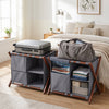 Bamboo luggage rack set with gray nylon compartments, designed for easy storage and holding up to 28-inch luggage.
