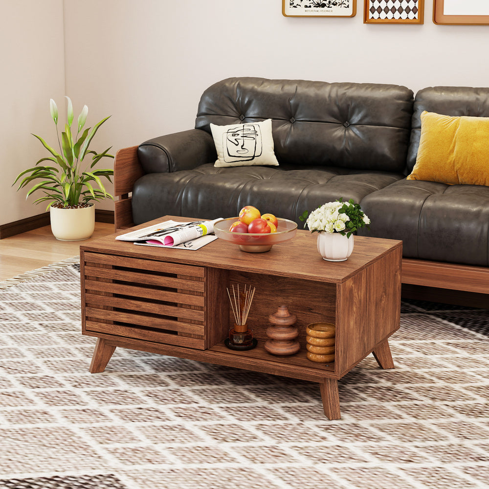 Lift-top coffee table with hidden compartment and sliding door, featuring a stylish brown finish for living room use.