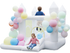 Inflatable bounce house with slide, basketball hoop, and colorful balloons, perfect for wedding parties and outdoor fun.