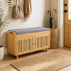 Bamboo shoe storage bench with lift top, removable cushion, and two-door cabinet for hallway organization.