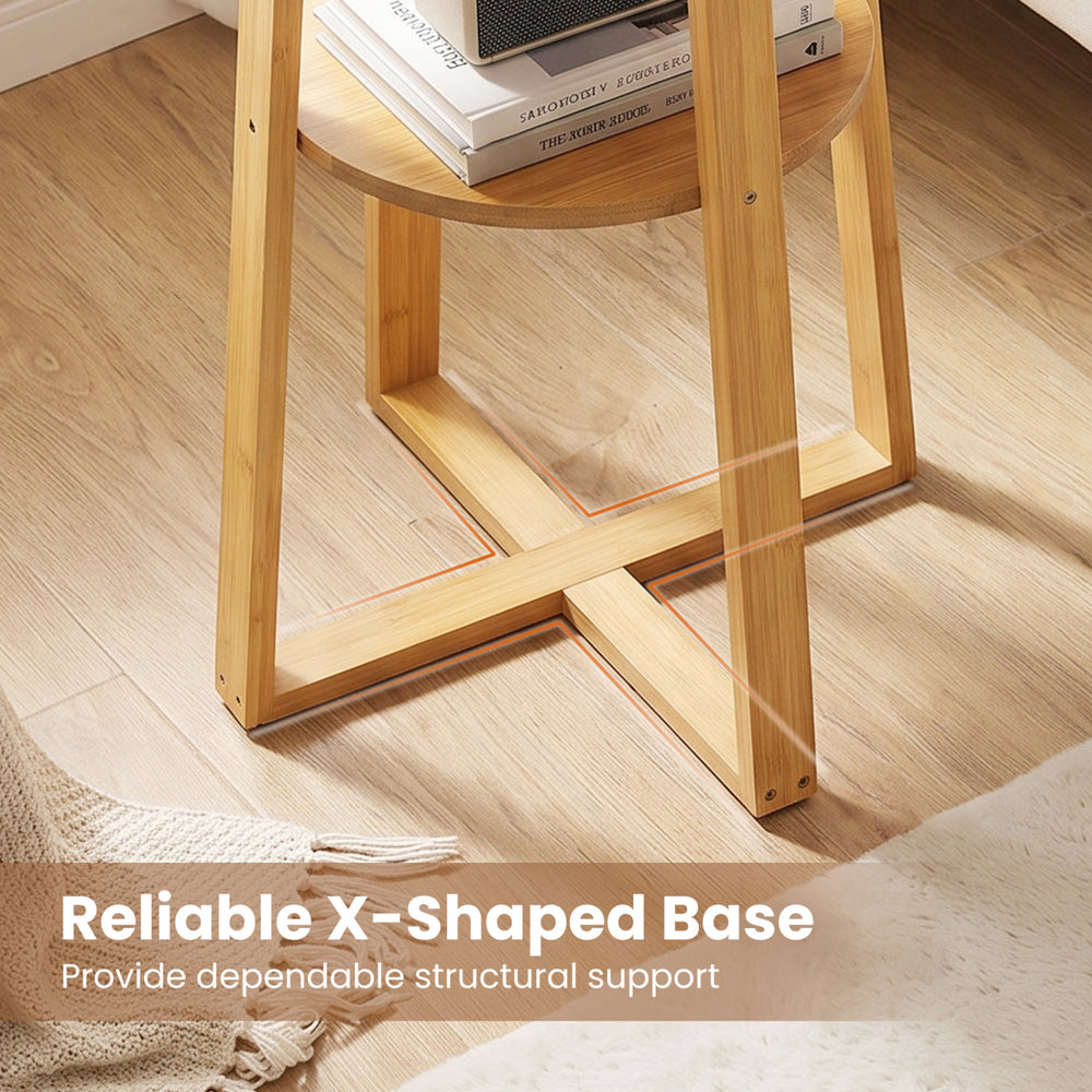 X-shaped base end table set with lower shelf, made of bamboo, ideal for magazines and coffee cups in any living space.