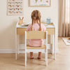 Wooden kids desk and chair set with a large tabletop and curved backrest, perfect for reading, drawing, and playing.