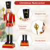 Colorful Christmas nutcracker with elegant hat and scepter, perfect for festive indoor and outdoor holiday displays.