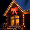 Extra-large 37-inch lighted Christmas bow decoration with 150 warm white LED lights for festive outdoor holiday displays.