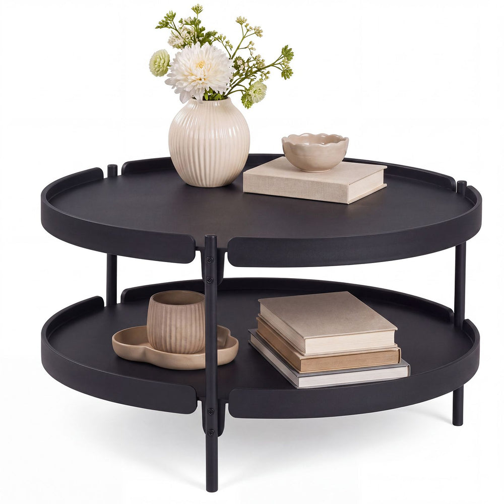 Round black coffee table featuring a sleek design and upper surface, ideal for modern living room essentials and decor.